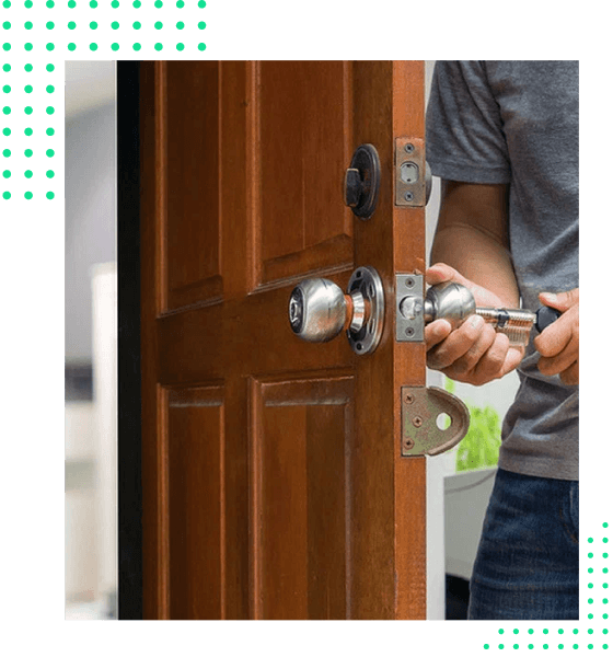 man fixing door locks